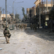 U.S. Marines patrol the Iraqi city of Fallujah in 2004 during Operation Phantom Fury. USMC Photo